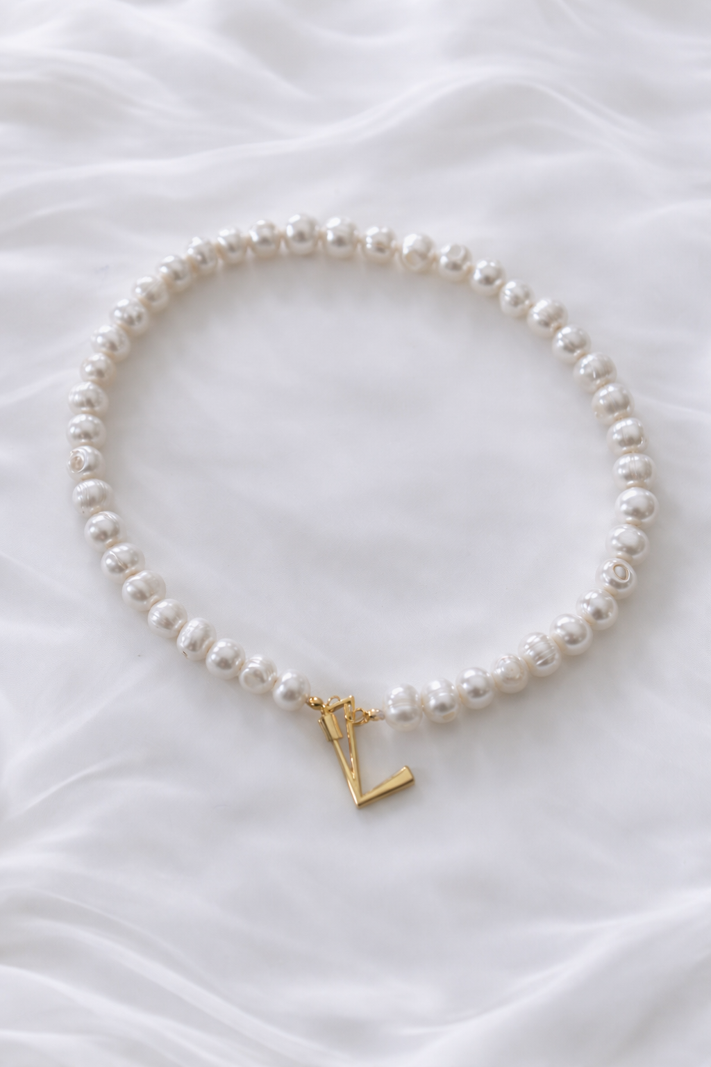 ´L´necklace